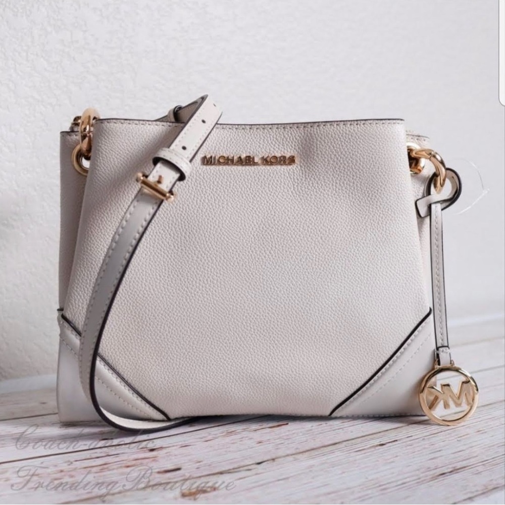 This is the Michael Kors Nicole vanilla crossbody.